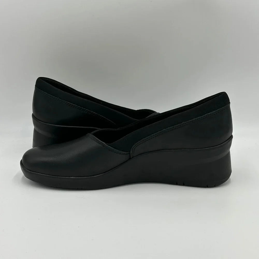 NWD Clarks Suttyn Walk Black Leather Wedge Slip On Shoes Womens Size 8.5 Comfort